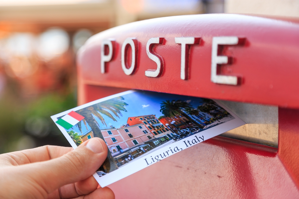 Male,send,a,postcard,to,a,red,mailbox,in,liguria,